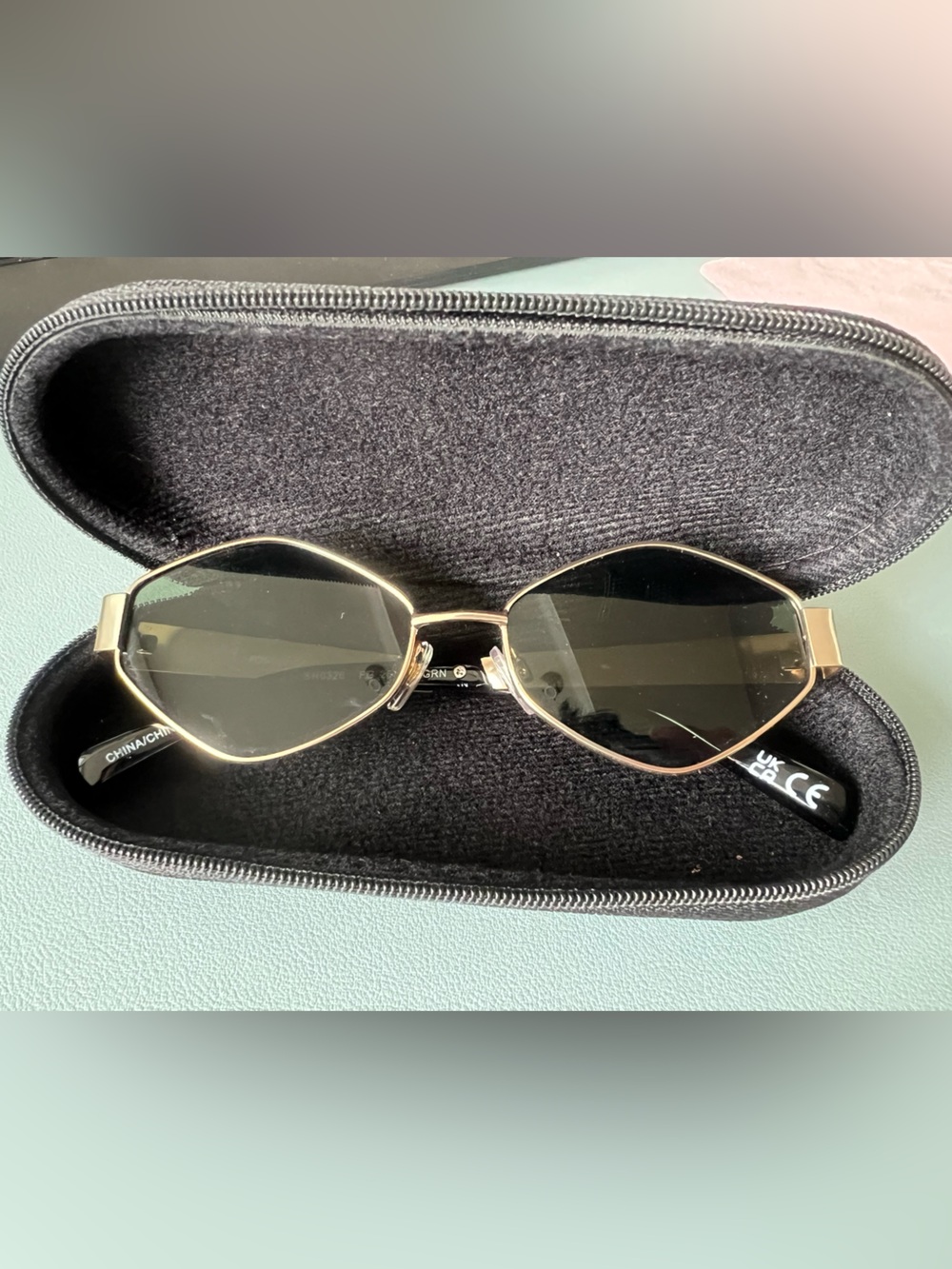 Foster Grant Gold Frame Black Lens Women’s Sunglasses